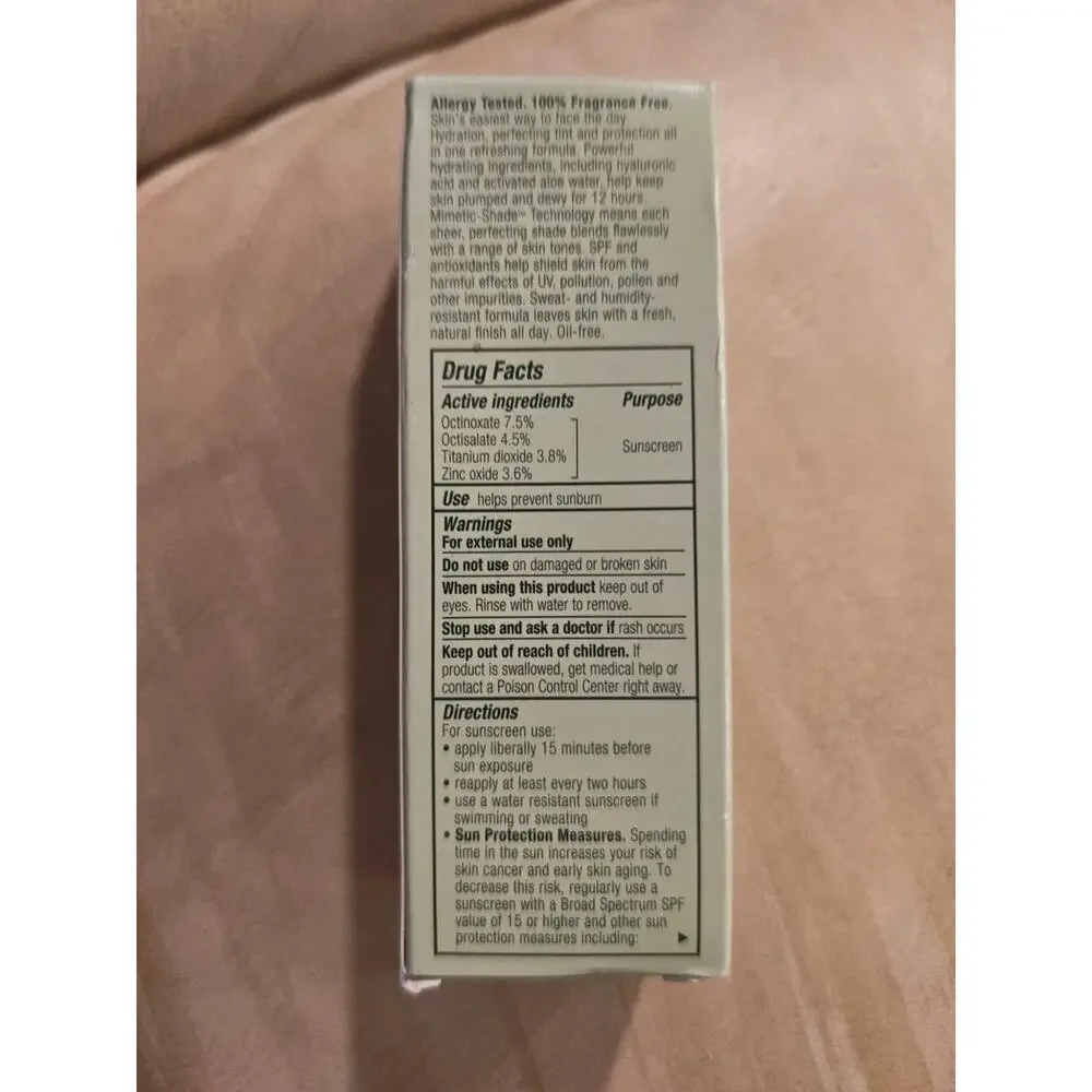 CLINIQUE moisture surge sheertint hydrator broad spectrum SPF 25